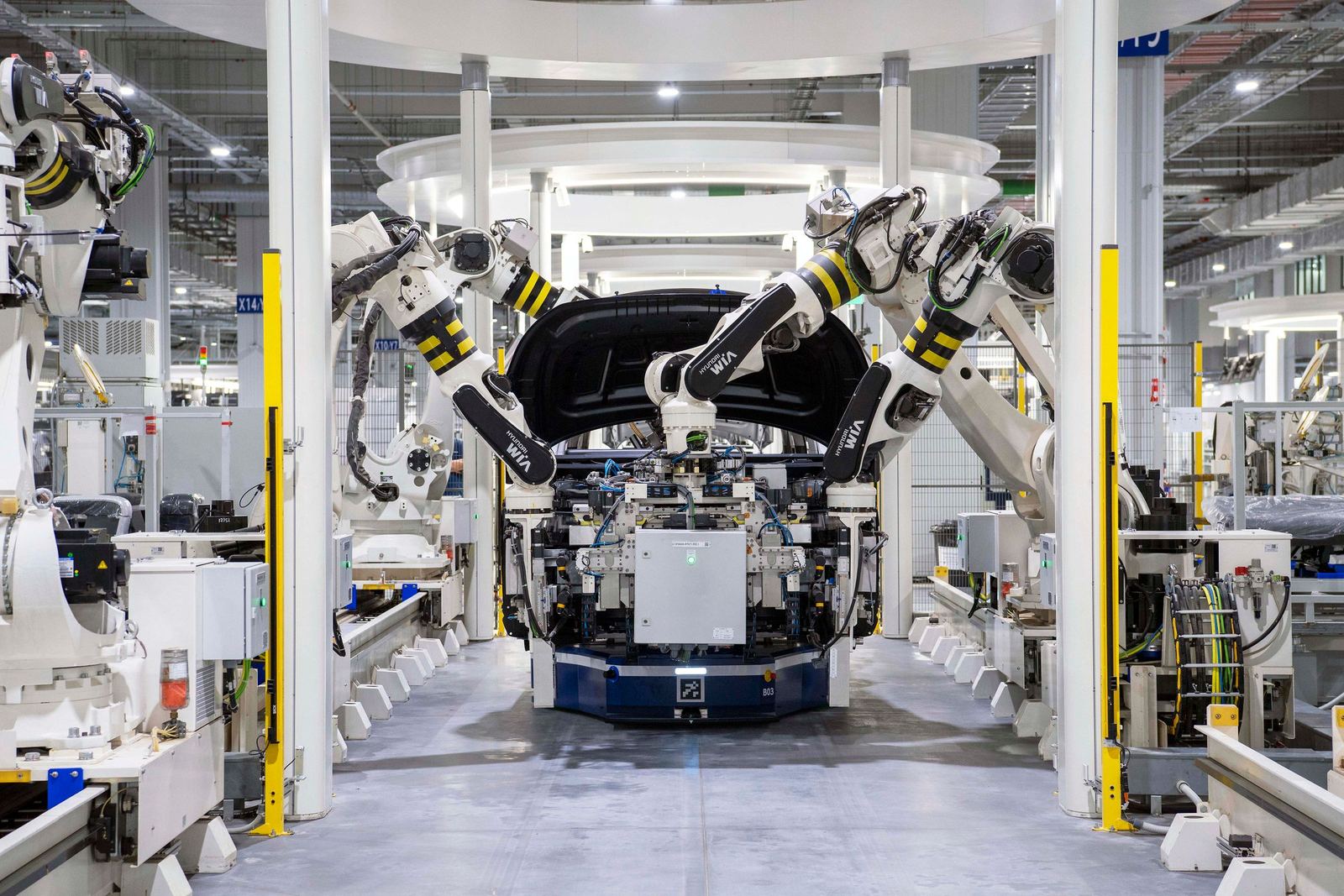 Robotic cell for body-shop subassembly welding