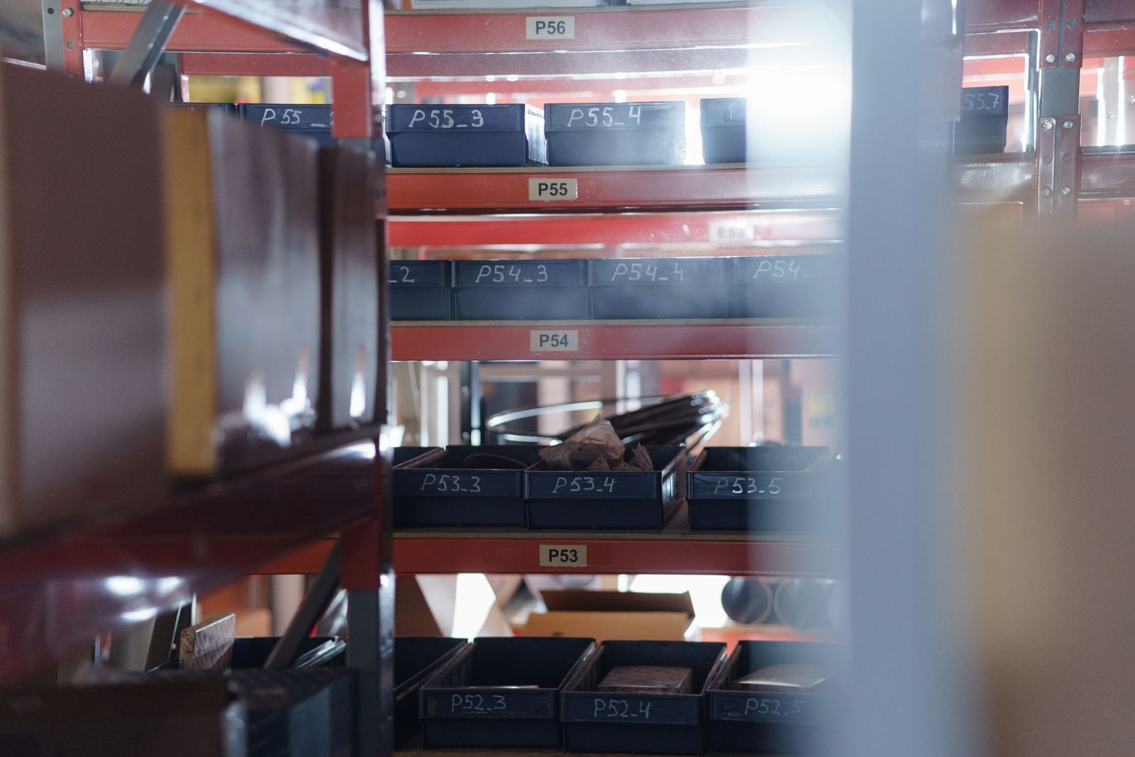 A controlled store with racked, labelled stock